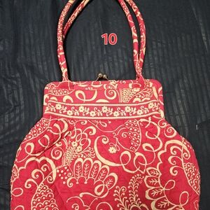 Vera Bradley kiss clasp shoulder bag in the retired "Twirly Birds Pink" pattern.
